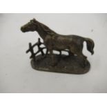 Miniature bronze figure of a horse on a naturalistic base, signed P.J. Mene, 3.25ins long