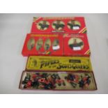 Boxed Britains figures, Pipers of the Scotts Guards together with three other later boxed Britains