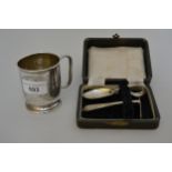 Floral engraved silver Christening mug together with a cased silver spoon and pusher