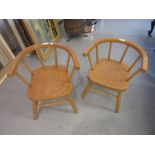 Pair of mid 20th Century child's beechwood bow back chairs, together with a pair of bentwood side