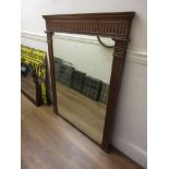 19th Century French walnut oval overmantel mirror with fluted cornice and side columns, 42ins wide x