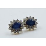 Pair of 9ct yellow gold oval sapphire and diamond cluster stud earrings