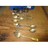 Small quantity of silver tea and coffee spoons together with three silver napkin rings