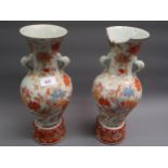 Pair of early 20th Century Japanese two handled pedestal vases painted with birds in landscape (at