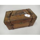 Small 19th Century leather travel case, unbranded, the hinged lid with an embossed crest of a