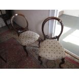 Pair of Victorian walnut balloon back side chairs on cabriole front supports together with a 19th