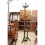 Early 20th Century oak hat and coat stand, on circular base with splay feet Signs of woodworm. Top