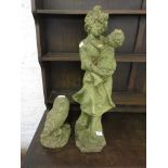 Weathered cast concrete garden figure of a girl carrying a child, 27ins high together with a similar