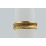 Middle Eastern engraved yellow metal wedding band, 4.5g Not tested, assumed to be of high carat