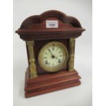 Early 20th Century American Ansonia mahogany mantel clock, the ceramic dial with Roman numerals