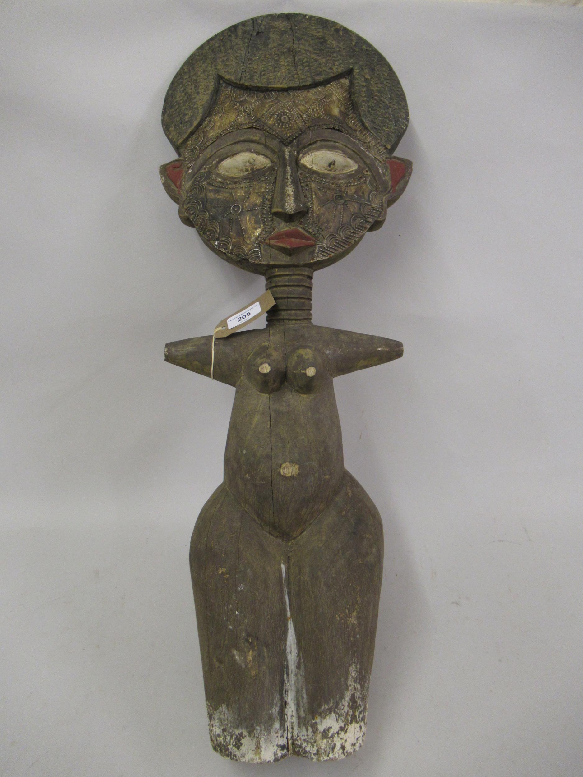 African carved wooden painted and embossed metal mounted standing fertility figure, 38ins high