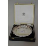 Modern silver circular dish with shaped rim, 7.75ins diameter, 10oz, in original fitted case There