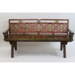 Chinese red lacquered and gilded bench having pierced and carved back support, open armrest and