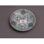 Small Chinese porcelain circular dish decorated with a stylised floral design, painted mark to the