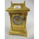 Good quality late 19th / early 20th Century gilt brass carriage type mantel clock, the architectural