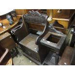 Victorian carved oak hall bench / stickstand, the shaped carved back above a box seat flanked by