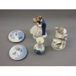 B & G Copenhagen porcelain group of a boy and girl embracing, together with a Royal Copenhagen group