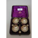 Cased set of four Victorian silver shell form salts with spoons All appear in good condition. No