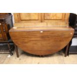 19th Century oval mahogany drop-leaf dining table on square moulded supports