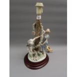 Lladro table lamp in the form of two girls beside a tree with a garland of flowers, 15ins high
