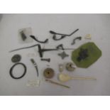 Collection of Roman and other ancient brooches, tweezers etc.