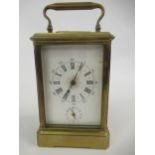 Late 19th Century French gilt brass carriage clock, the enamel dial with Roman and Arabic numerals