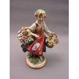 G. Crazzoli for Capo di Monte, porcelain figure of a flower seller, 10.25ins high