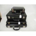 Two black leather attache case type collector's boxes, together with two others