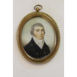 Early 19th Century oval portrait miniature of a naval officer in uniform, mounted in an oval gilt