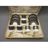 Cased set of six Copeland Spode Lincoln pattern coffee cans and saucers (one saucer restored),