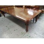 Good quality Victorian rectangular mahogany extending dining table, raised on turned fluted and
