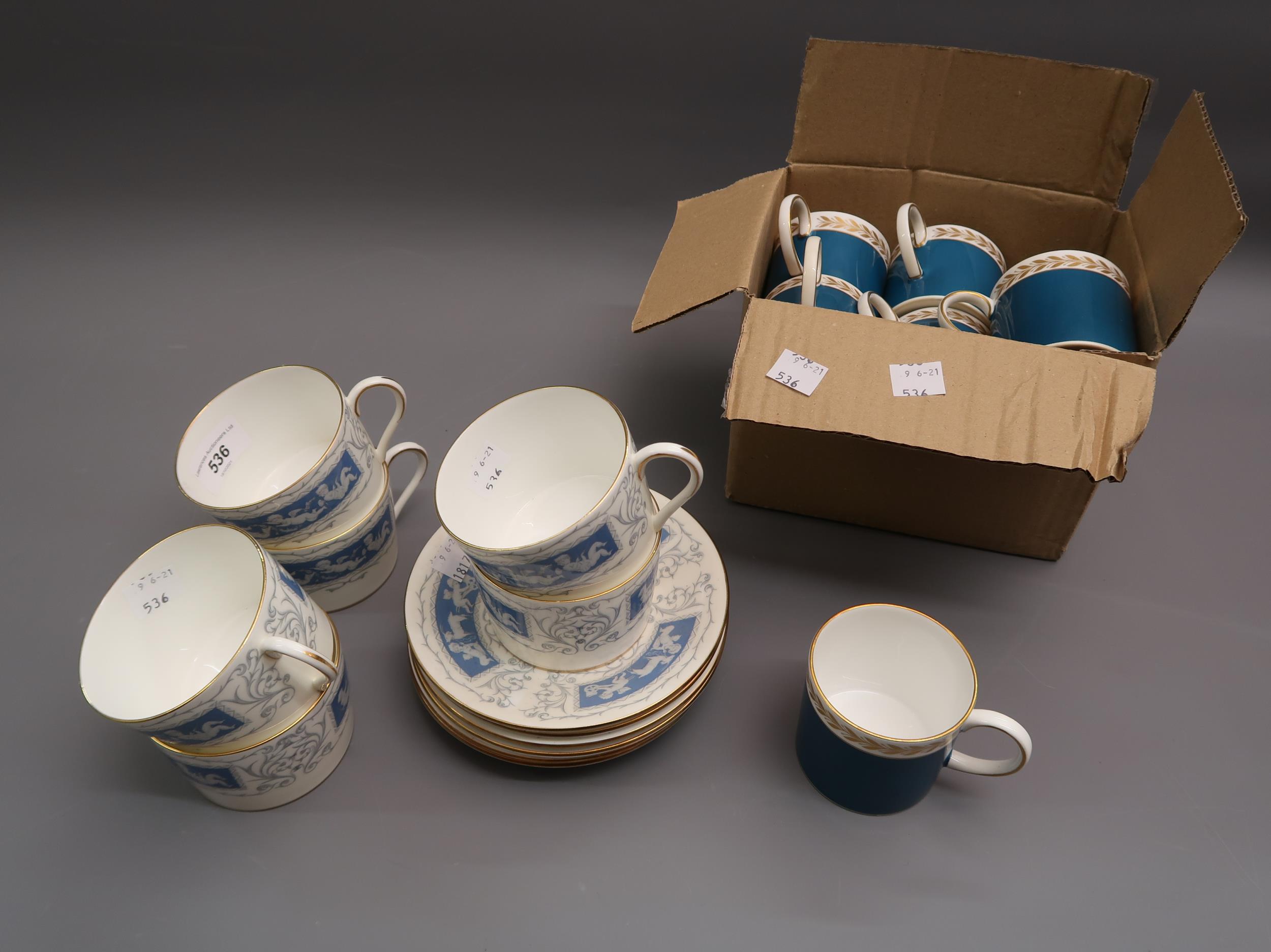 Set of six, Susie Cooper, gilt and turquoise coffee cups, with matching saucers and a set of six,