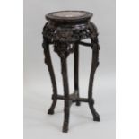 Good quality 20th Century circular carved hardwood and marble inset jardiniere stand, 30.5ins high