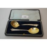 Cased pair of London silver sugar sifter spoon and preserve spoon Excellent condition. No damage