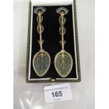 Cased pair of Continental silver gilt and enamel coffee spoons of floral design Good condition,