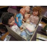 Box containing a quantity of various 20th Century plastic and composition dolls