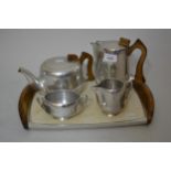 Picquot ware teaset on matching tray (five pieces total)