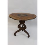 19th Century French floral ringwood marquetry inlaid tilt top table with gilt metal mounts, on an