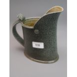 Walter Keeler (born 1942), salt glazed stoneware jug decorated with an all-over pitted greenish