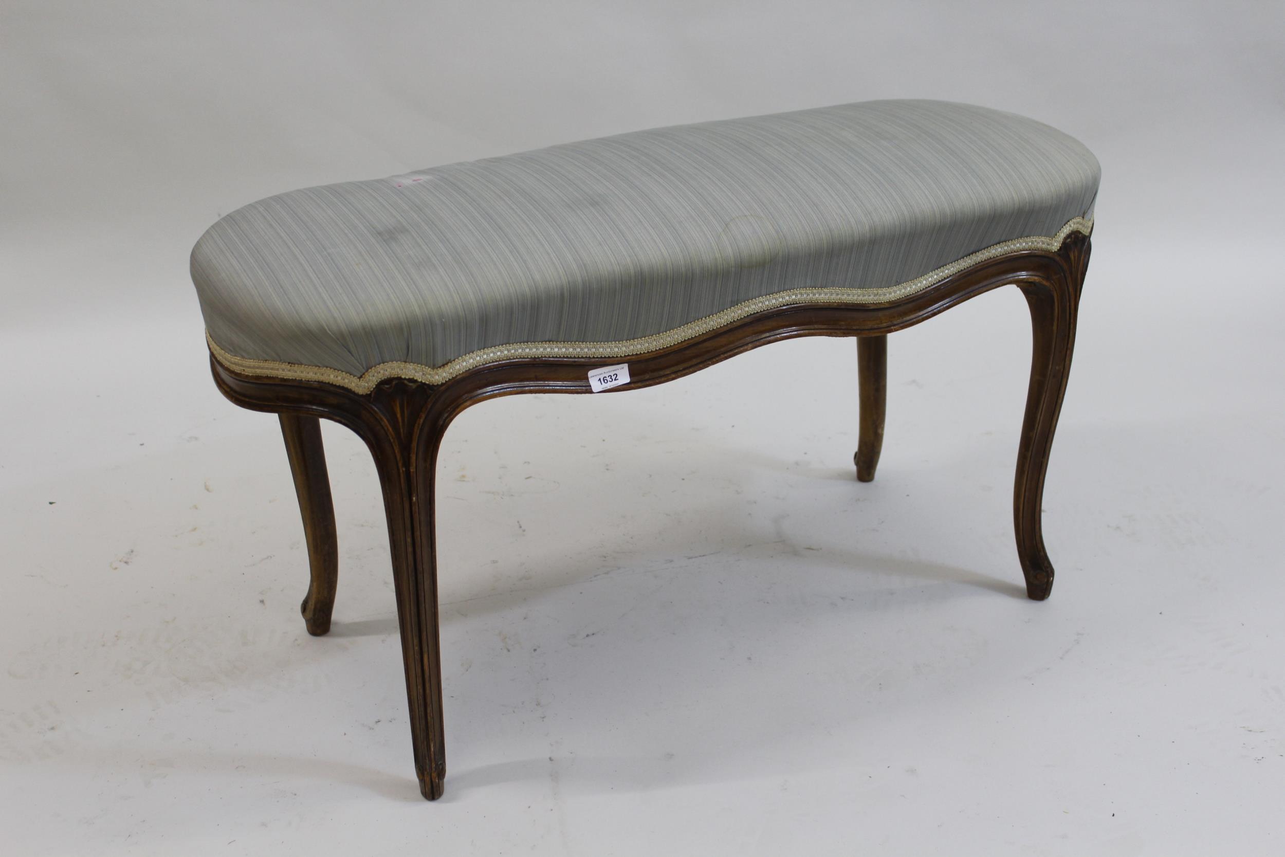 Early 20th Century French oval beechwood upholstered stool on cabriole supports