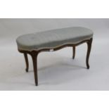 Early 20th Century French oval beechwood upholstered stool on cabriole supports