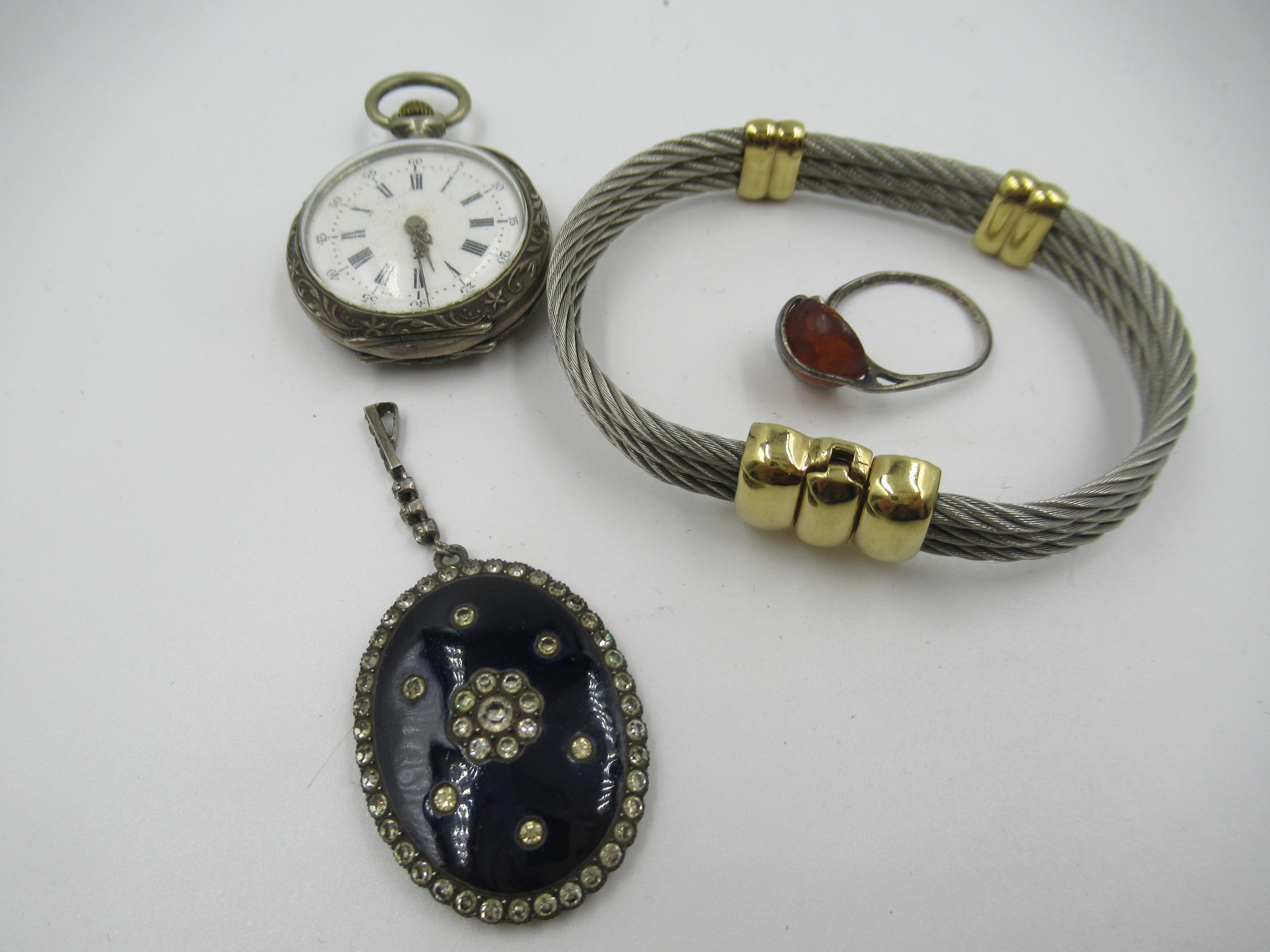 Silver cased Continental fob watch with enamel dial and Roman numerals, a silver ring mounted with