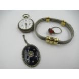 Silver cased Continental fob watch with enamel dial and Roman numerals, a silver ring mounted with