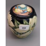 Moorcroft baluster form jar and cover by Emma Bossons, ' Paradise Flower ' 2003, 5.75ins high,