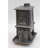 Carron, 19th Century / early 20th Century cast iron log burner having lift-off cover with single