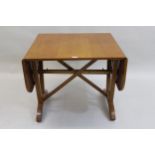 David Joel, Honey oak rectangular drop leaf side table, with crossover stretchers and twin splayed