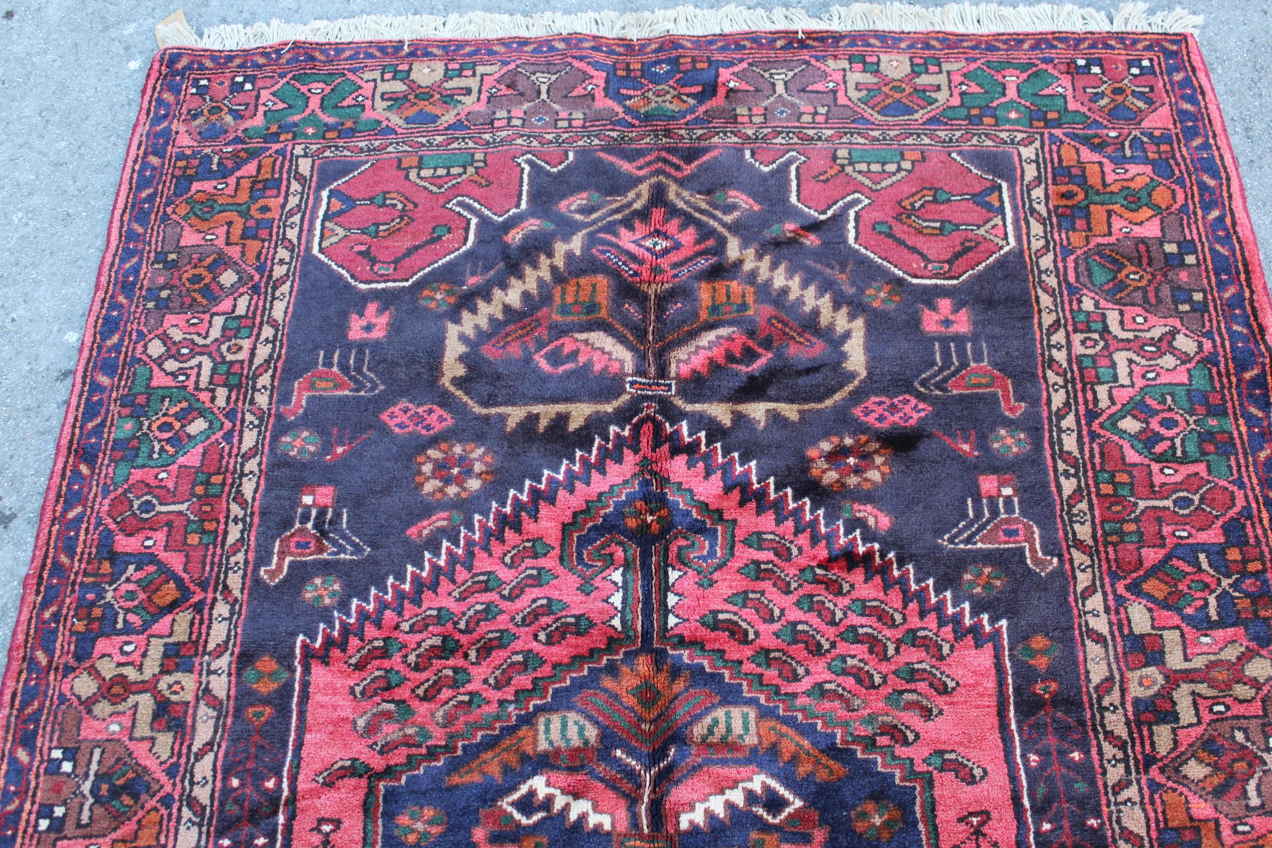 Zanjan rug with a medallion and all-over stylised design on a dark ground with borders, 2.06m x 1.4m - Image 2 of 4