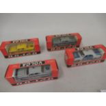 Group of four Russian Volga boxed diecast metal model vehicles