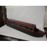 Large scratch built scale model of a narrow boat in burgundy, black and blue livery, 4ft long