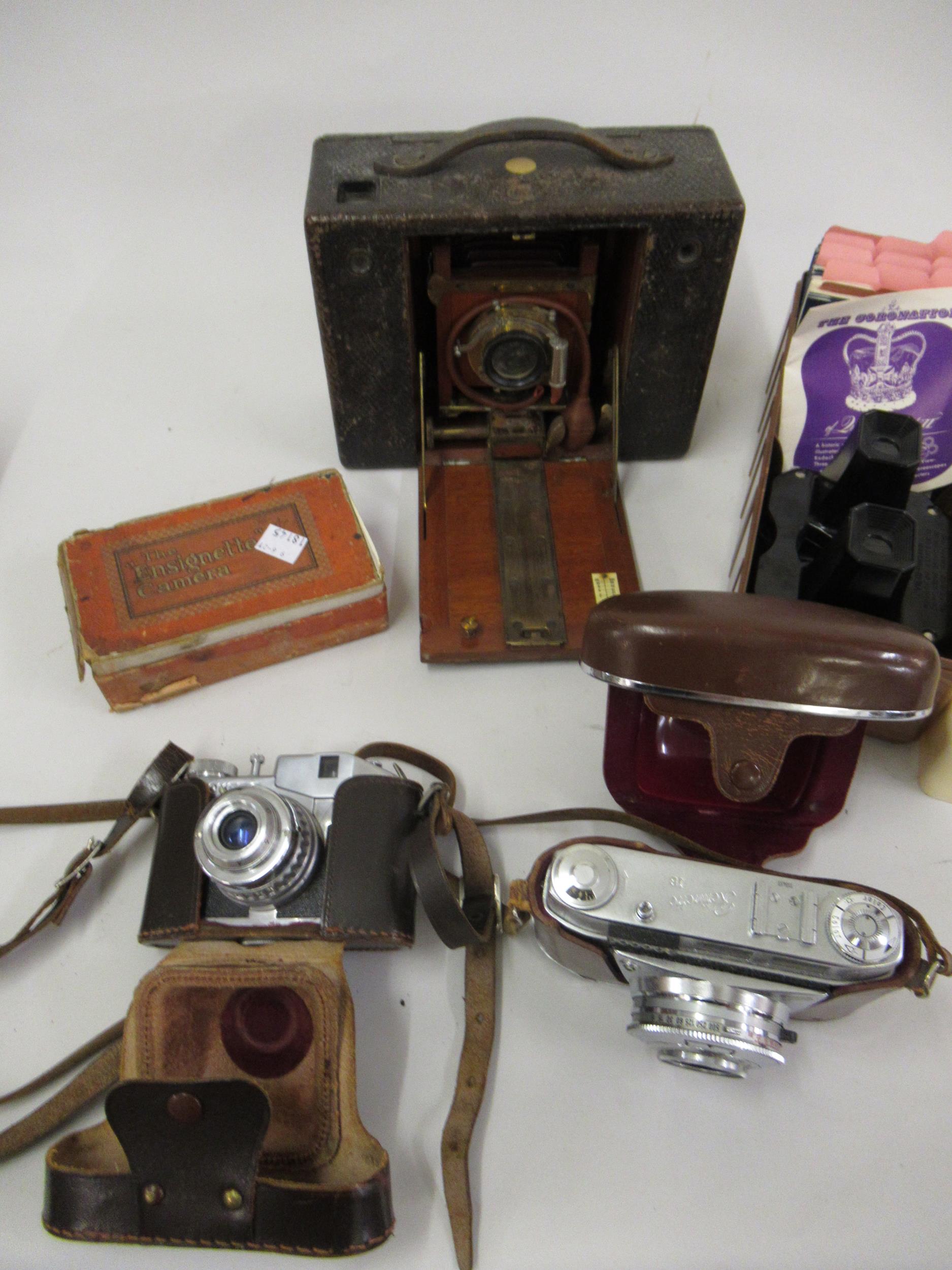 Kodak cartridge bellows camera and three other cameras and a View Master